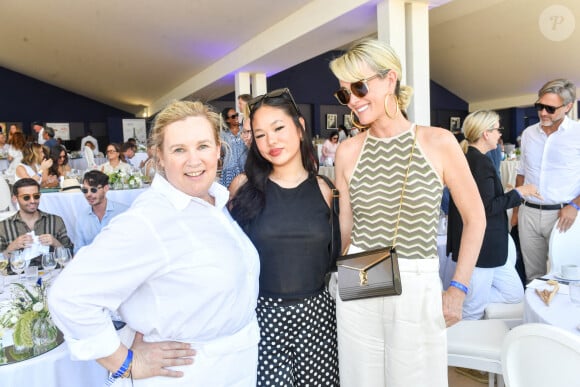 Exclusif - La cheffe Hélène Darroze, Laeticia Hallyday et sa fille Joy dans l'Espace VIP lors de la 9ème édition du "Longines Paris Eiffel Jumping" au Champ de Mars à Paris, France, le 25 juin 2023. © Perusseau-Veeren/Bestimage 