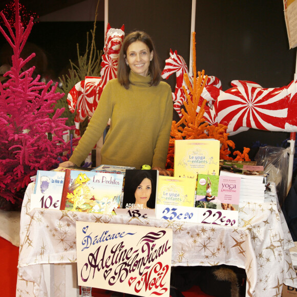 Adeline Blondieau dédicace ses livres dont le dernier "Le yoga des enfants" au marché de Noël de la Défense le 14 Décembre 2019 © Christophe Aubert via Bestimage