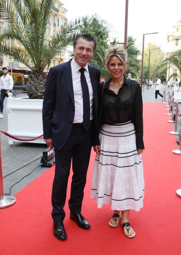 Christian Estrosi, le maire de Nice, et sa femme Laura Tenoudji Estrosi à la première du film "Boite Noire" dans le cadre du Festival CINEROMAN au cinéma Pathé Gare du Sud à Nice, France, le 19 juin 2021. © Denis Guignebourg/Bestimage 