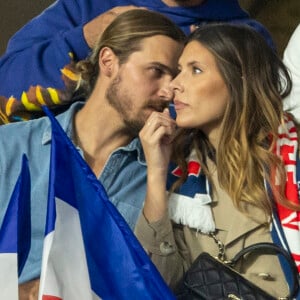 Camille Cerf (Miss France 2015) et son compagnon Théo Fleury - People dans les tribunes lors du match de la 5ème et avant-dernière journée de Ligue des nations entre la France et l'Autriche (2-0) au Stade de France à Saint-Denis le 22 septembre 2022.