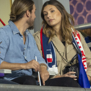 Camille Cerf (Miss France 2015) et son compagnon Théo Fleury - People dans les tribunes lors du match de la 5ème et avant-dernière journée de Ligue des nations entre la France et l'Autriche (2-0) au Stade de France à Saint-Denis le 22 septembre 2022.