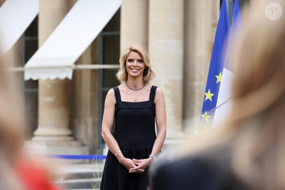 Exclusif - Sylvie Tellier - La présidente de l'association "Les Bonnes Fées", l'ancienne directrice générale d'un concours national de beauté et Miss France 2022, Sylvie Tellier décorée des l'insignes de chevalier de l'ordre national du Mérite par la secrétaire d'Etat, chargée de l'Économie sociale et solidaire et de la Vie associative dans les jardins de l'hôtel Matignon à Paris, France, le 26 juin 2023. C'est son investissement dans le milieu associatif qui vaut à l'ancienne directrice de miss France, cette distinction. Sylvie Tellier est co-fondatrice, avec plusieurs anciennes miss France, de l'association Les Bonnes fées, qui a pour objectif d'améliorer les conditions de vie des femmes à travers le financement de projets comme la création d'un lieu de détente dans les centres de cancérologie des hôpitaux ou des ateliers socio-esthétiques pour des femmes atteintes d'un cancer. © Dominique Jacovides/Bestimage