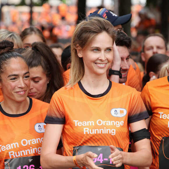 Ophélie Meunier (présentatrice) lors du marathon Orange Night Run, une boucle de 5,274 km le long des quais de Seine, pour tenter de remporter l'un des 1000 dossards pour le Marathon Pour Tous des Jeux Olympiques de Paris 2024, à Paris, France, le 17 juin 2023. © Jonathan Rebboah/Panoramic/Bestimage