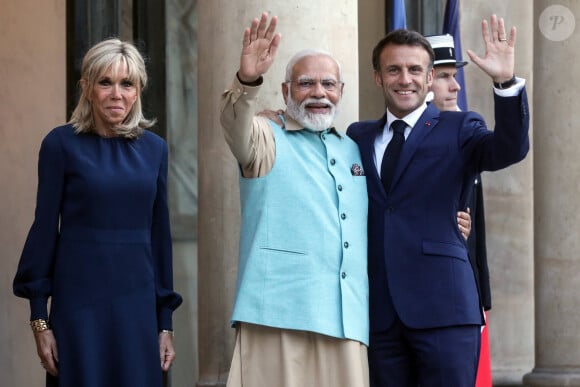 Un repas qui en a laissé certains assez dubitatifs.
Le président de la république française, Emmanuel Macron et sa femme la première dame, Brigitte Macron recoivent pour un dîner le Premier ministre de la République de l'Inde, Narendra Modi, au palais présidentiel de l'Elysée, à Paris, France, le 13 juillet 2023. © Stéphane Lemouton/Bestimage 