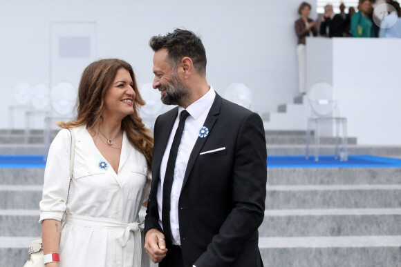 Marlène Schiappa Secrétaire d'Etat auprès de la Première ministre, chargée de l'Economie sociale et solidaire et de la Vie associative et sonn compagnon lors de la cérémonie du 143ème défilé militaire du 14 juillet, jour de la Fête Nationale, sur les Champs-Elysées et la place de la Concorde, à Paris, France, le 14 juillet 2023. © Stéphane Lemouton/Bestimage 