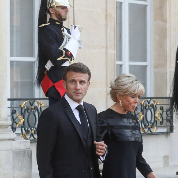 Le président français Emmanuel Macron et la première dame, Brigitte Macron lors d'un dîner officiel au palais de l'Élysée, en marge du sommet du nouveau pacte financier mondial, à Paris, le 22 juin 2023, au palais de l'Elysee, Paris. © Stéphane Lemouton / Bestimage 