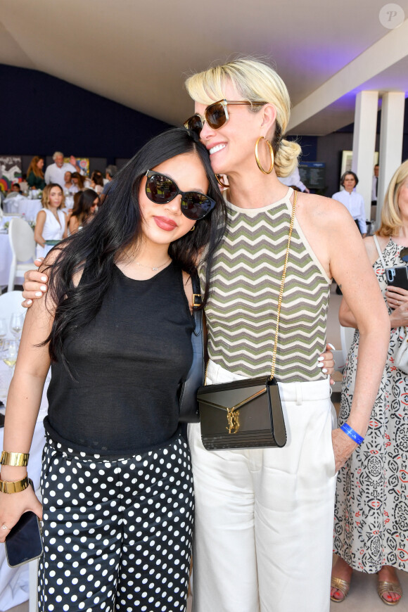 Exclusif - Laeticia Hallyday et sa fille Joy dans l'Espace VIP lors de la 9ème édition du "Longines Paris Eiffel Jumping" au Champ de Mars à Paris, France, le 25 juin 2023. © Perusseau-Veeren/Bestimage