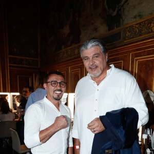 Exclusif - Brahim Asloum, David Douillet - Backstage - Enregistrement de l'émission "Paris 2024 le concert événement...dans un an les jeux" sur le parvis de l'Hôtel de Ville de Paris, diffusée le 25 juillet sur France 2 à 21h10. Le 3 juillet 2023 © Tiziano Da Silva-Christophe Clovis / Bestimage