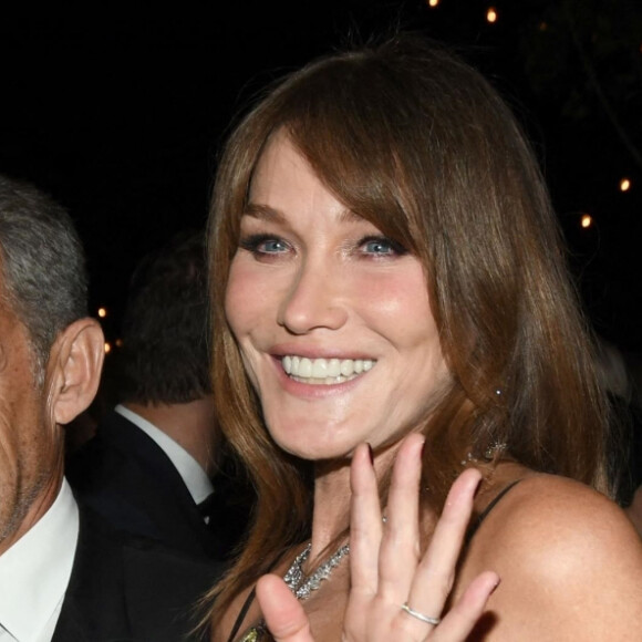 Carla Bruni et son mari Nicolas Sarkozy à la soirée "Women In Motion" par Kering au Château de la Castre lors du 75ème Festival International du Film de Cannes, le 22 mai 2022. 