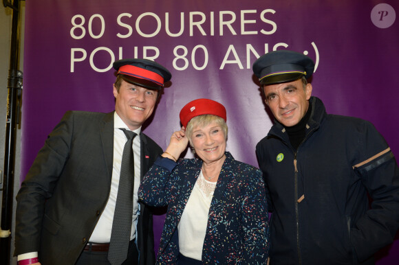 Stéphane Chéry (directeur général adjoint projet d' entreprise, communication et image du groupe SNCF), Simone Hérault (la voix culte de SNCF), Nikos Aliagas - La SNCF fête ses 80 ans à la Gare de Lyon, Paris le 12 mars 2018. © Rachid Bellak/Bestimage