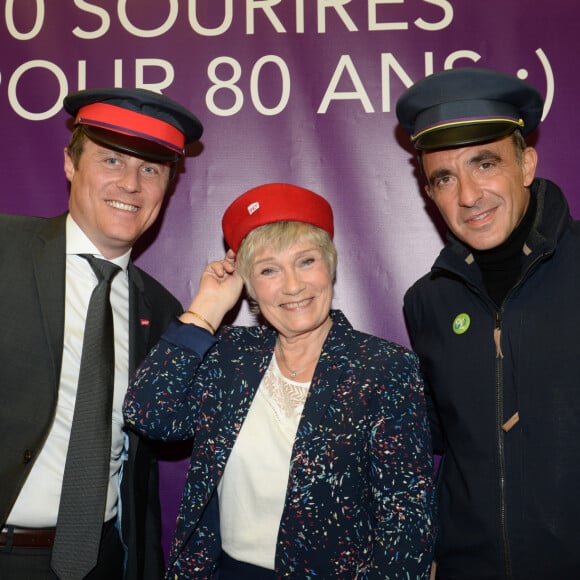 Stéphane Chéry (directeur général adjoint projet d' entreprise, communication et image du groupe SNCF), Simone Hérault (la voix culte de SNCF), Nikos Aliagas - La SNCF fête ses 80 ans à la Gare de Lyon, Paris le 12 mars 2018. © Rachid Bellak/Bestimage