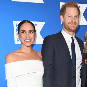 Le prince Harry a exposé une photo de son petit Archie dans sa nouvelle série.
Le prince Harry et Megan Markle au photocall de la soirée de gala "Robert F. Kennedy Human Rights Ripple of Hope" à l'hôtel Hilton de New York City, New York, Etats-Unis. 