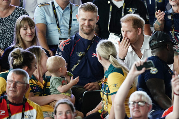 Le prince Harry, duc de Sussex, et sa femme Meghan Markle, duchesse de Sussex, assistent aux finales de natation à la Merkur Spiel-Arena lors des Jeux Invictus à Düsseldorf, en Allemagne, le mercredi 13 septembre 2023. 