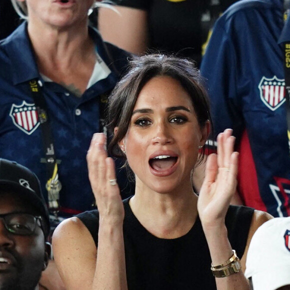 Le prince Harry, duc de Sussex, et sa femme Meghan Markle, duchesse de Sussex, assistent aux finales de natation à la Merkur Spiel-Arena lors des Jeux Invictus à Düsseldorf, en Allemagne, le mercredi 13 septembre 2023. 