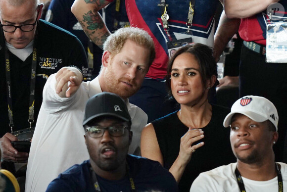 Le prince Harry, duc de Sussex, et sa femme Meghan Markle, duchesse de Sussex, assistent aux finales de natation à la Merkur Spiel-Arena lors des Jeux Invictus à Düsseldorf, en Allemagne, le mercredi 13 septembre 2023. 