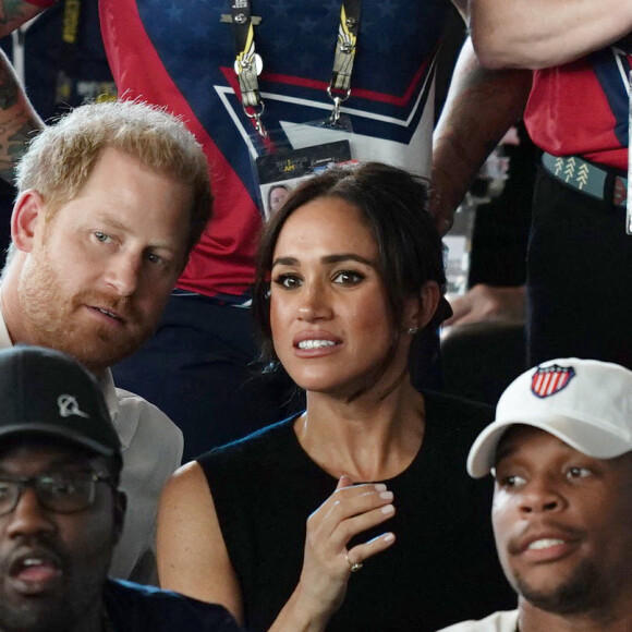 Le prince Harry, duc de Sussex, et sa femme Meghan Markle, duchesse de Sussex, assistent aux finales de natation à la Merkur Spiel-Arena lors des Jeux Invictus à Düsseldorf, en Allemagne, le mercredi 13 septembre 2023. 