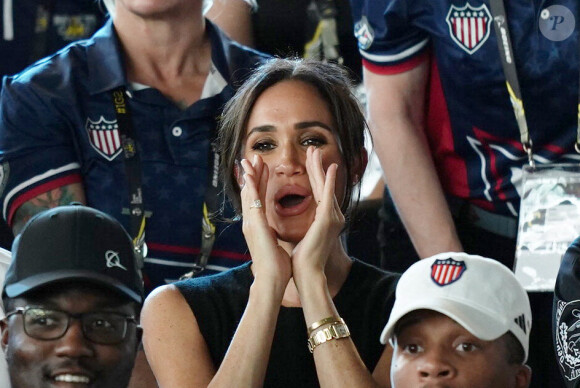 Le prince Harry, duc de Sussex, et sa femme Meghan Markle, duchesse de Sussex, assistent aux finales de natation à la Merkur Spiel-Arena lors des Jeux Invictus à Düsseldorf, en Allemagne, le mercredi 13 septembre 2023. 