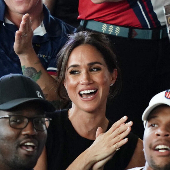 Le prince Harry, duc de Sussex, et sa femme Meghan Markle, duchesse de Sussex, assistent aux finales de natation à la Merkur Spiel-Arena lors des Jeux Invictus à Düsseldorf, en Allemagne, le mercredi 13 septembre 2023. 