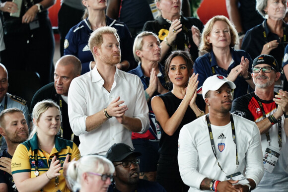 Le prince Harry, duc de Sussex, et sa femme Meghan Markle, duchesse de Sussex, assistent aux finales de natation à la Merkur Spiel-Arena lors des Jeux Invictus à Düsseldorf, en Allemagne, le mercredi 13 septembre 2023. 