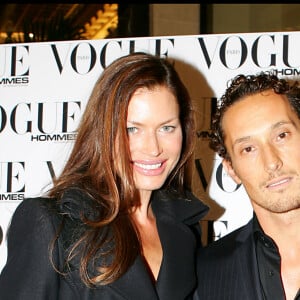 Carre Otis et Bruno Danto - Soirée Vogue hommes au VIP Room à Paris.