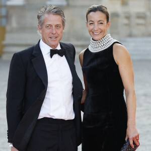 Hugh Grant et sa femme Anna Elisabet Eberstein - Dîner d'Etat au château de Versailles en l'honneur de la visite officielle du roi et de la reine d'Angleterre en France (20 - 22 septembre 2023), le 20 septembre 2023. 150 invités triés sur le volet ont été conviés à cette occasion. © Jacovides-Moreau / Bestimage