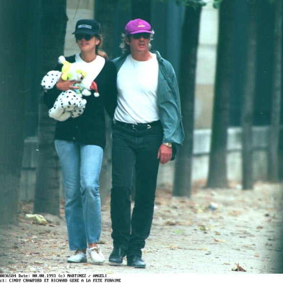 Cindy Crawford et Richard Gere à la fête foraine des Tuileries à Paris.