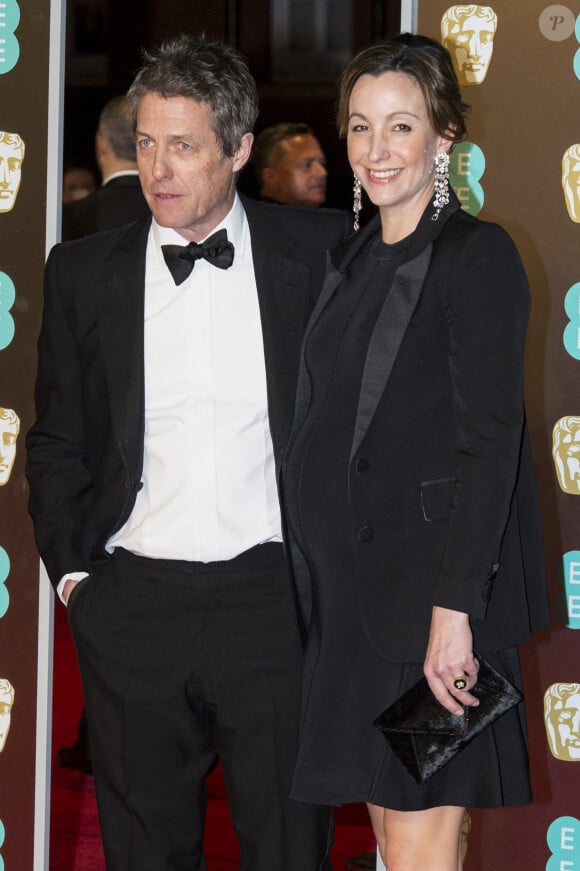 Hugh Grant et sa compagne Anna Eberstein (enceinte), à la 71ème cérémonie des British Academy Film Awards (BAFTA) au Royal Abert Hall à Londres, le 18 février 2018. © Ray Tang via Zuma Press/Bestimage