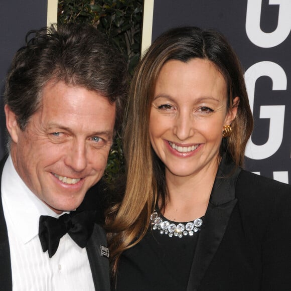 Hugh Grant et Anna Eberstein sur le tapis rouge de la 75ème cérémonie des Golden Globe Awards au Beverly Hilton à Los Angeles, le 7 janvier 2018.