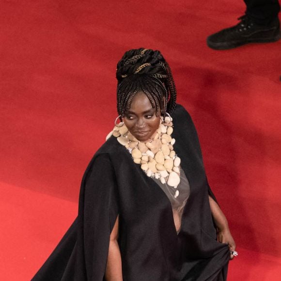 Aïssa Maïga (Charlotte Tilbury pour le maquillage, Dessange pour la coiffure, Bijoux Boucheron, Robe Stéphane Rolland, Chaussures Roger Vivier) - Montée des marches du film " Stars At Noon " lors du 75ème Festival International du Film de Cannes. Le 25 mai 2022 © Pool / Bestimage 