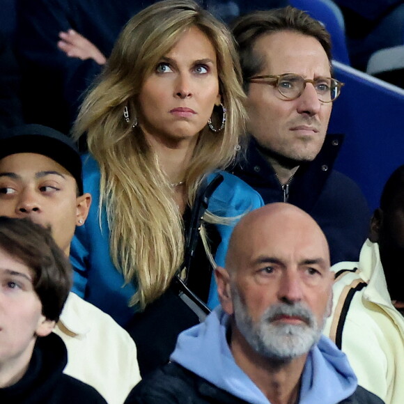 Ophélie Meunier et son mari Mathieu Vergne - People des les tribunes de la coupe du Monde de Rugby France 2023 - Match de quart de finale "France-Afrique du Sud (28-29)" au Stade de France à Saint-Denis 15 octobre 2023. © Moreau-Jacovides/Bestimage