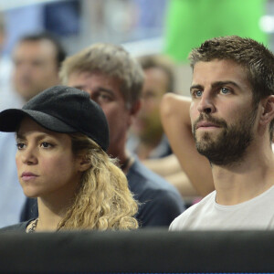 Gerard Piqué pas au mieux financièrement
 
Shakira enceinte et son compagnon Gerard Pique assistent au quart de finale de la coupe du monde de basket entre la Slovénie et les États-Unis à Barcelone en Espagne.