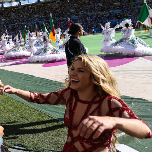 La chanteuse Shakira, son compagnon Gerard Piqué et leur fils Milan lors de la finale de la coupe du monde Allemagne-Argentine à Rio de Janeiro, le 13 juillet 2014.