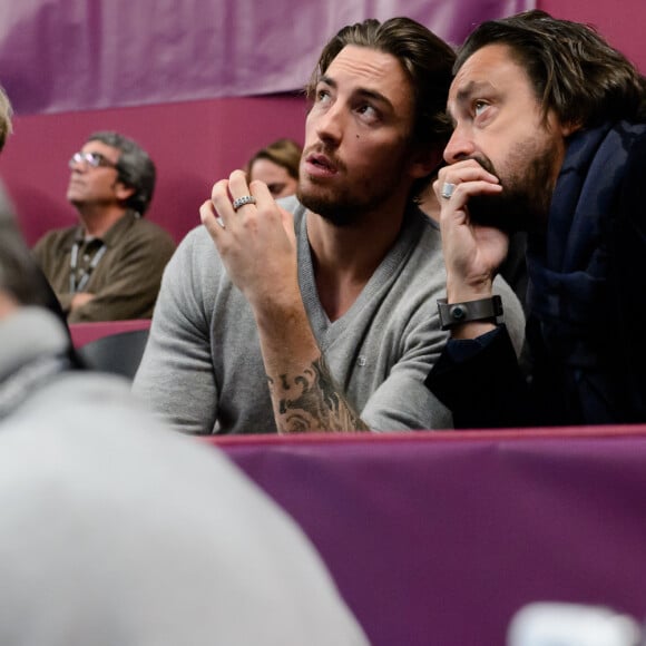 Henri Leconte et son fils Maxime - Soiree d'Amelie Mauresmo a l'occasion du 22eme Open de tennis GDF SUEZ au Stade Pierre de Coubertin a Paris le 28 Janvier 2014. Amelie Mauresmo (marraine de l’Institut Curie depuis 7 ans) donne une nouvelle dimension a son engagement dans la lutte contre le cancer. Elle choisit ainsi de mettre a profit sa notoriete et son esprit sportif et devient l’ambassadrice d’operations destinees a developper la notoriete de l’Institut Curie : Les defis d’Amelie pour Curie.