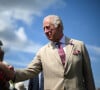 The Mirror a révélé qu'il était sorti de prison et n'avait écopé que de 2 amendes, une première de 1153 euros, l'autre de 461 euros
Le roi Charles III d'Angleterre et Camilla Parker Bowles, reine consort d'Angleterre, au Sandringham Flower Show à Sandringham House (Norfolk), le 26 juillet 2023. 