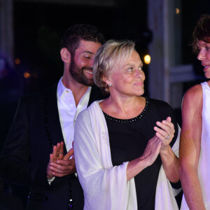 Anne Le Nen a pendant des années voulu le retrouver en vain.
Muriel Robin et sa femme Anne Le Nen - 9ème gala étoilé Patrick Mouratoglou (coach légendaire de S. Williams) au profit de la Fondation Champ'seed à la Mouratoglou Academy afin de soutenir les jeunes espoirs du tennis mondial à Biot le 18 juin 2023.