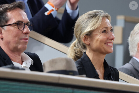 Nicolas Hieronimus (directeur général de L'Oréal) et Anne-Sophie Lapix en tribune (jour 13) lors des Internationaux de France de Tennis de Roland Garros 2022 à Paris, France, le 3 juin 2022. © Dominique Jacovides/Bestimage 
