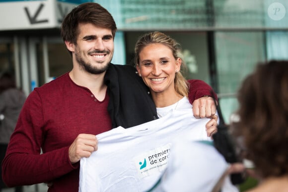 Tatiana Golovin et son compagnon Hugo Bonneval - Journée évasion organisée par l'association "Premiers de Cordée" pour le 10ème anniversaire de la "Semaine du Sport à l'Hôpital" au Stade de France, le 21 mai 2014.