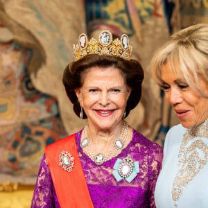 La reine Silvia de Suède et Brigitte Macron - Dîner d'état en l'honneur du président Emmanuel Macron et de Brigitte Macron au Palais royal de Stockholm le 30 janvier 2024. 
