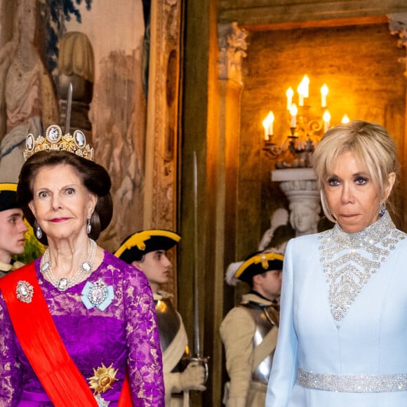 Et malgré Brigitte Macron, accusée de manquer de respect au roi alors qu'elle ne profitait juste que de la traduction, tout s'est bien passé ! 
La reine Silvia de Suède, Brigitte Macron - Dîner d'Etat pour la visite du président Emmanuel Macron et de sa femme Brigitte, Stockholm, Suède, 30 janvier 2024.