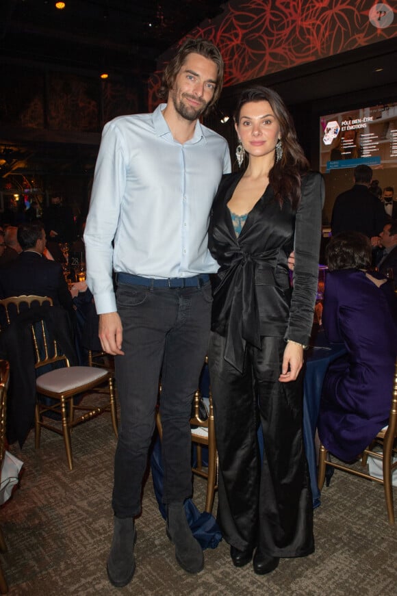 Exclusif - Le nageur Camille Lacourt et sa compagne Alice Detollenaere lors de la soirée de gala de l'Institut Rafaël, maison de l'après Cancer, au Pavillon Gabriel à Paris le 13 décembre 2021. © Erez Lichtfeld / Bestimage