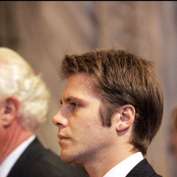 Le prince Emmanuel Philibert de Savoie, Clotilde Courau avec la princesse Marina Doria et le prince Victor-Emmanuel de Savoie assistent à une messe en hommage à Umberto II d'Italie et la reine Marie Jose le 19 mars 2005