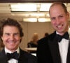 Heureusement, le prince William gère pour lui. 
Le prince William, prince de Galles et Tom Cruise participent au dîner de gala caritatif " London's Air Ambulance " au Raffles London à Londres, Royaume Uni, le 7 février 2024. 