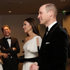 Le prince William, prince de Galles, et Catherine (Kate) Middleton, princesse de Galles, arrivent à la 76ème cérémonie des British Academy Film Awards (BAFTA) au Royal Albert Hall à Londres, le 19 février 2023. 