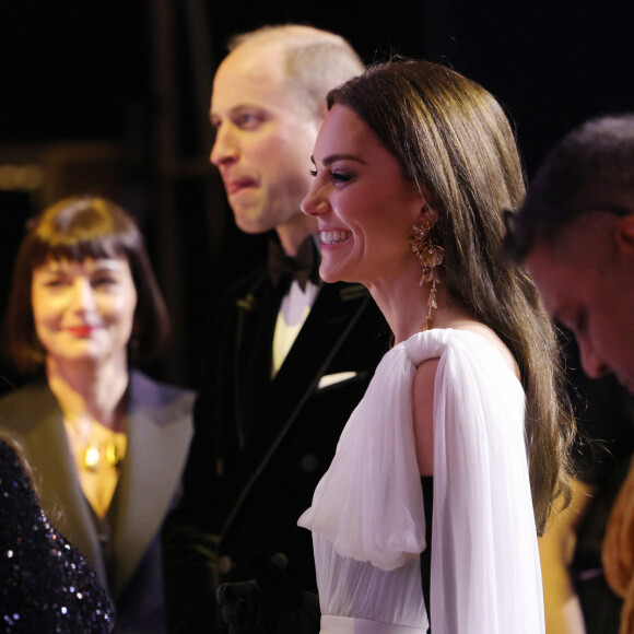 Le prince William, prince de Galles, et Catherine (Kate) Middleton, princesse de Galles, arrivent à la 76ème cérémonie des British Academy Film Awards (BAFTA) au Royal Albert Hall à Londres, le 19 février 2023. 