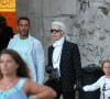 Et si vous voulez goûter à un morceau de cette histoire, c'est désormais possible.
Exclusif - Karl Lagerfeld se promène avec Sébastien Jondeau (son assistant personnel et égérie) et son filleul et mannequin fétiche Hudson Kroenig à Saint-Tropez, le 14 août 2015.