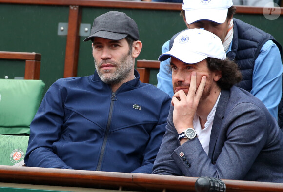 Jalil Lespert, Mathias Vicherat dans les tribunes lors du Tournoi de Roland-Garros (les Internationaux de France de tennis) à Paris, le 29 mai 2016. © Dominique Jacovides/Bestimage 