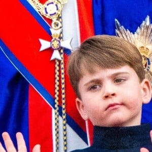 Le prince Louis de Galles - La famille royale britannique salue la foule sur le balcon du palais de Buckingham lors de la cérémonie de couronnement du roi d'Angleterre à Londres le 5 mai 2023. 