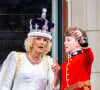 A moins qu'elle ne parle de Louis, le fils de sa fille ! 
Camilla Parker Bowles, reine consort d'Angleterre et Louis Lopes - La famille royale britannique salue la foule sur le balcon du palais de Buckingham lors de la cérémonie de couronnement du roi d'Angleterre à Londres le 5 mai 2023. 