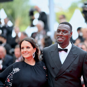 Helene Sy et Omar Sy arrivant à la projection de Top Gun : Maverick dans le cadre du 75ème Festival de Cannes le 18 mai 2022 à Cannes, France. Photo par Franck Castel/ABACAPRESS.COM