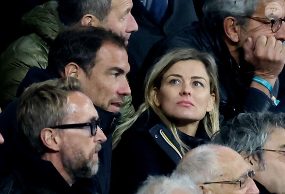 Laure Boulleau enceinte et son compagnon Bruno Cheyrou, Philippe Caverivière - People des les tribunes de la coupe du Monde de Rugby France 2023 - Match de quart de finale "France-Afrique du Sud (28-29)" au Stade de France à Saint-Denis 15 octobre 2023. © Moreau-Jacovides/Bestimage